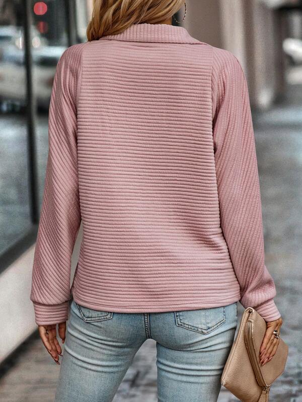 Eliza | Elegante jersey con cuello en V cremallera
