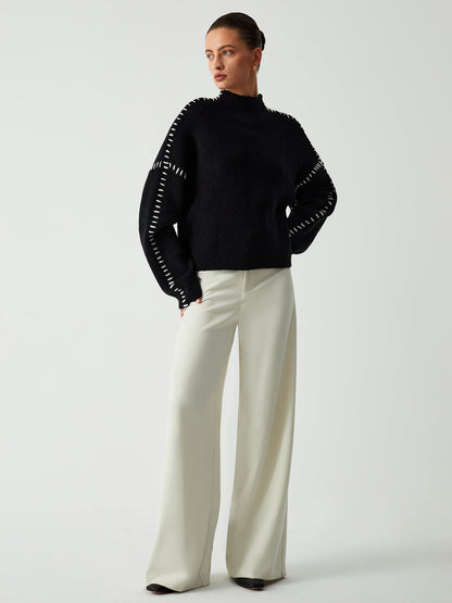 Alma | Jersey oversize de cuello alto con detalles de piqué