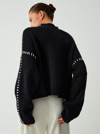 Alma | Jersey oversize de cuello alto con detalles de piqué