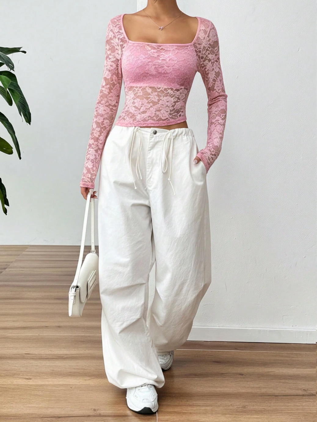 Blusa de encaje transparente para mujer con cuello elegante y dobladillo asimétrico